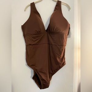Plunge neck line, one piece swimsuit.